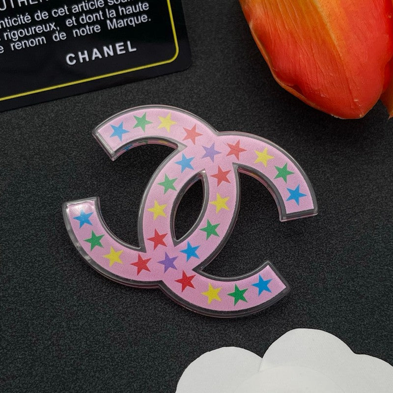 18K CC Pink & Black Star Brooch